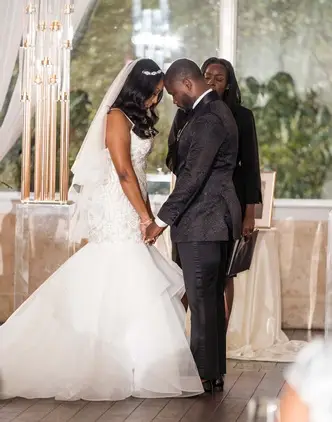 couple at end of wedding ceremony before kiss.