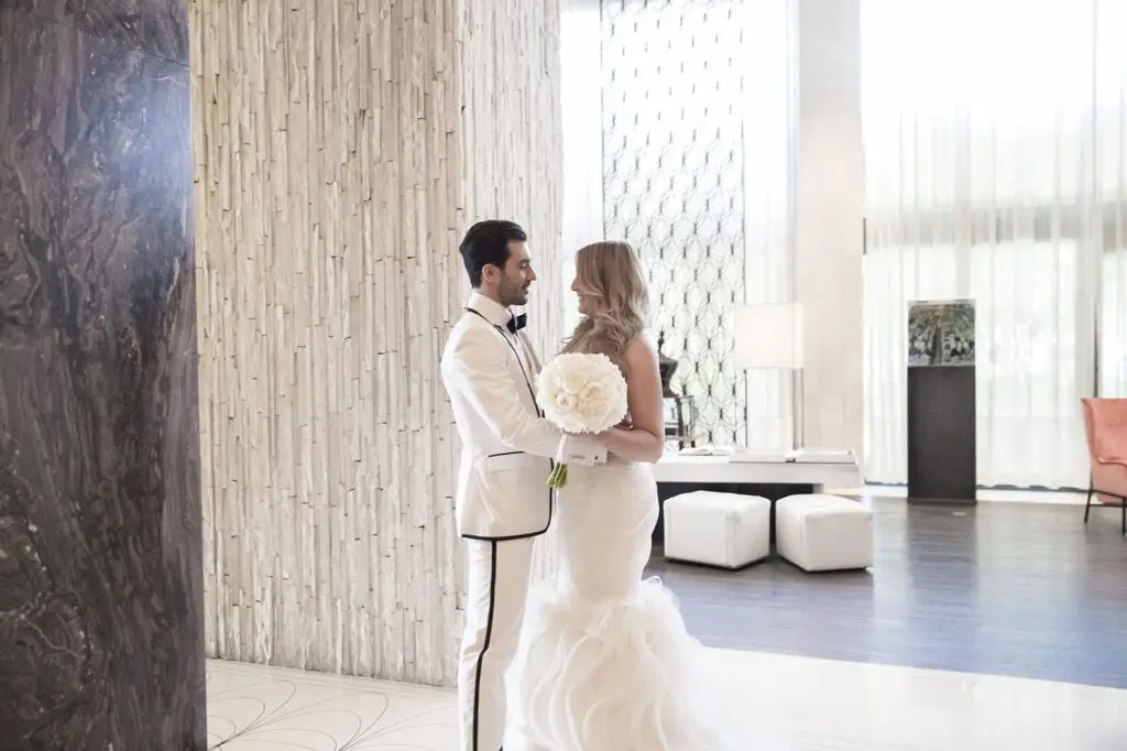 Bride and Groom Embrace During Their First Look Captured by Nashville Wedding Photographer