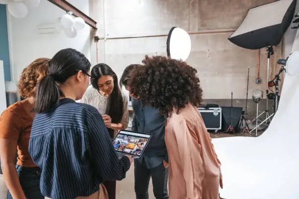 Photographer directing clients during photo shoot to get the best possible shots.